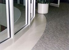 remove industrial carpet and restore concrete floor
