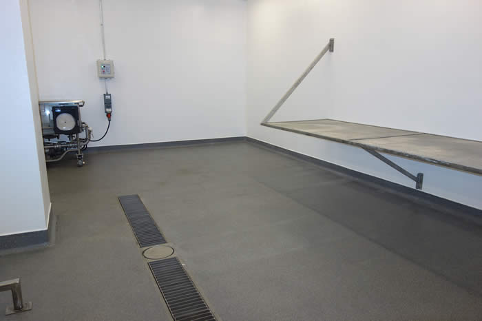 sloping industrial concrete floor resurfacing